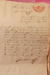 Documento con el característico sello "Mueran los salvajes unitarios. ¡Vivan los federales!". Fuente: Museo Notarial Argentino